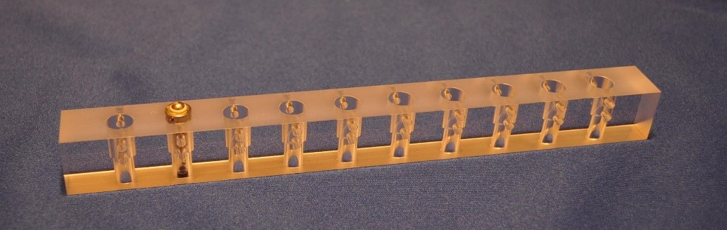 Image of Lamp base bonding process using precision gauge